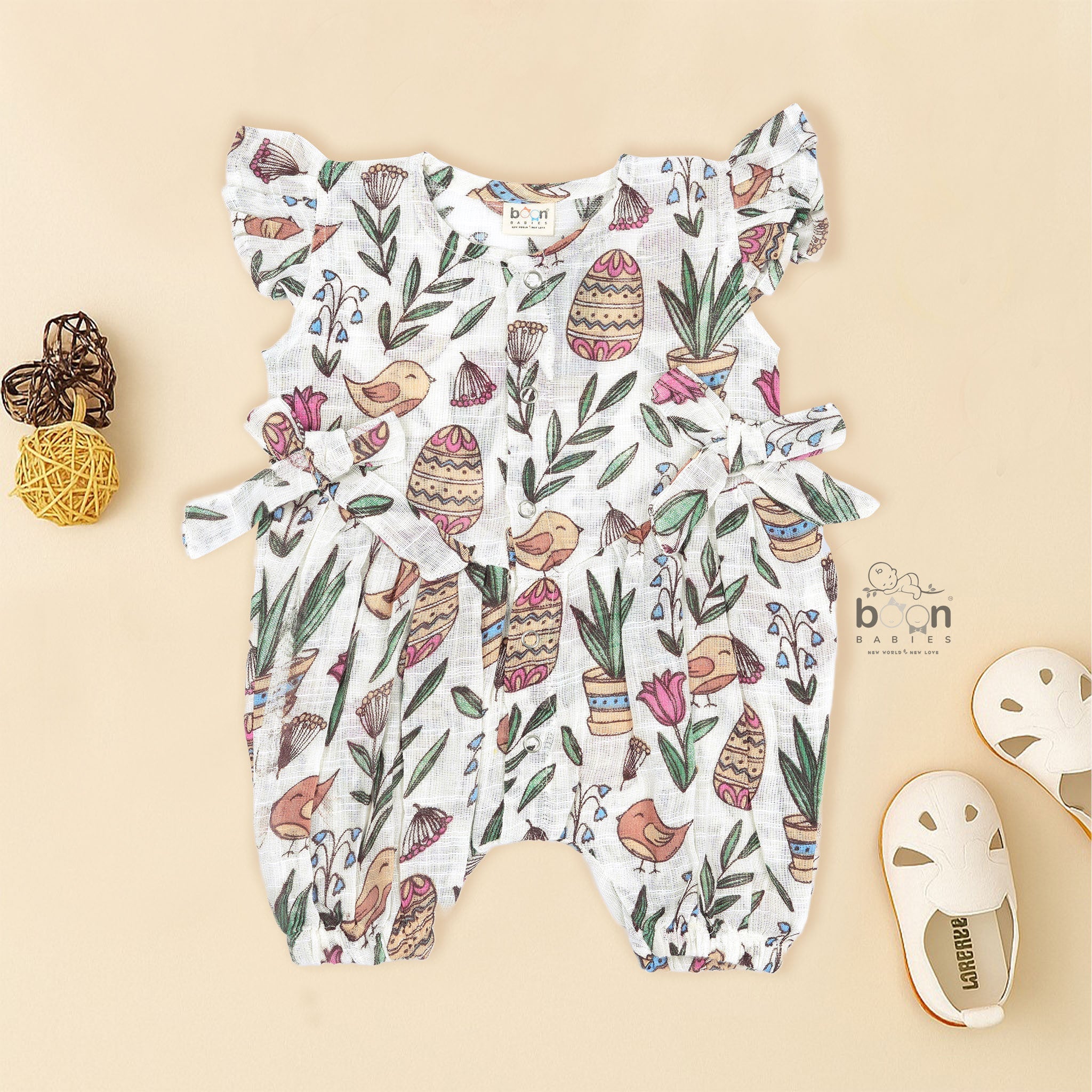 Cotton baby romper with botanical bird print from Booon Babies, soft and cute for 0-6 months.