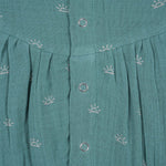 Crinkled muslin baby romper in dusty green with white sun print and flutter sleeves – perfect for 0 to 12 months, from Boon Babies baby cloths collection in Coimbatore.