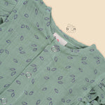 Mint green baby romper in crinkled muslin with leafy print and flutter sleeves, designed for newborns aged 0 to 12 months – Boon Babies Coimbatore collection.
