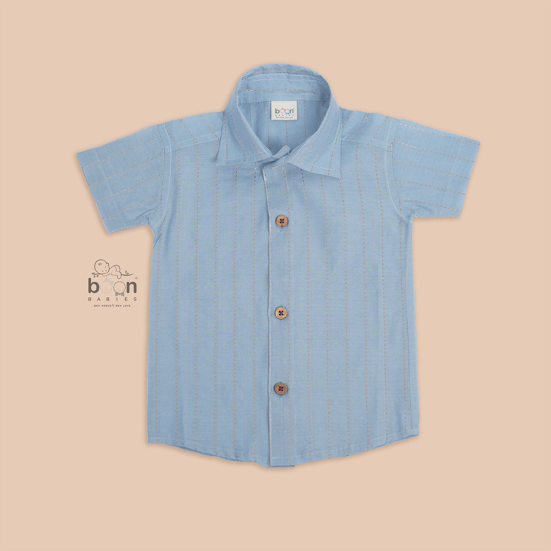 Light blue silk shirt for boys with subtle vertical gold detailing and wooden buttons – traditional festive wear by Boon Babies.
