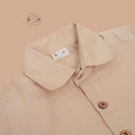 Beige-gold silk shirt & dhoti with golden zari border for boys aged 6M–5Y. Traditional festive wear for Onam, weddings & celebrations.