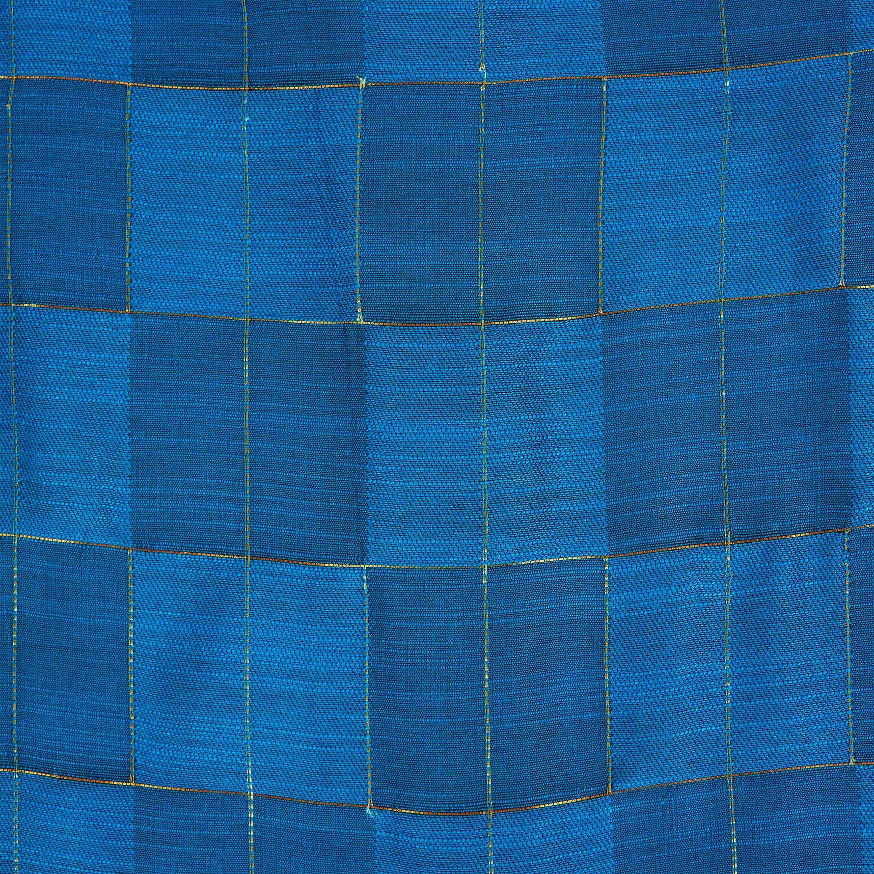 Blue checked silk shirt with Chinese collar and white dhoti with gold border – boys traditional outfit from Boon Babies, styled flatlay.
