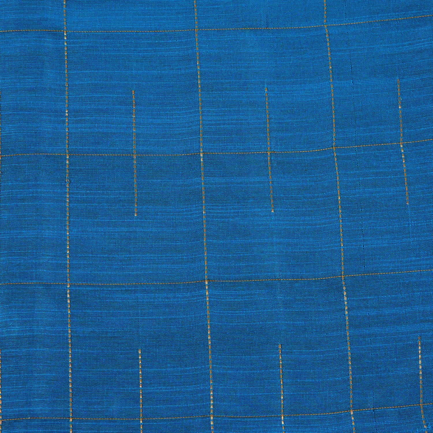 Boys festive outfit featuring a royal blue checked silk shirt and white dhoti with gold border – traditional South Indian attire by Boon Babies.
