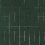 Dark green checked silk Chinese collar shirt with white dhoti and golden border – boys traditional wear flatlay by Boon Babies.
