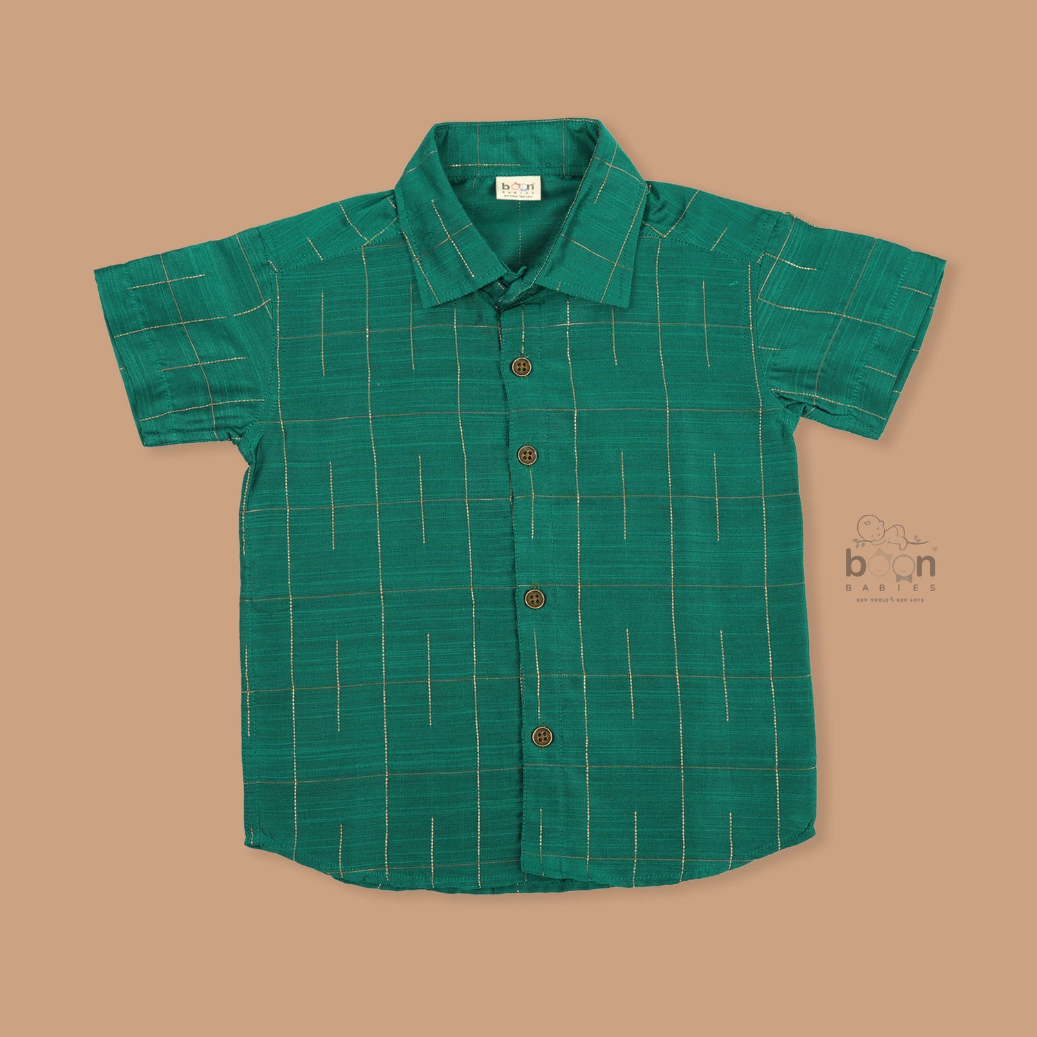 Green silk checked shirt with white dhoti featuring golden border – traditional South Indian boys ethnic wear set by Boon Babies.
