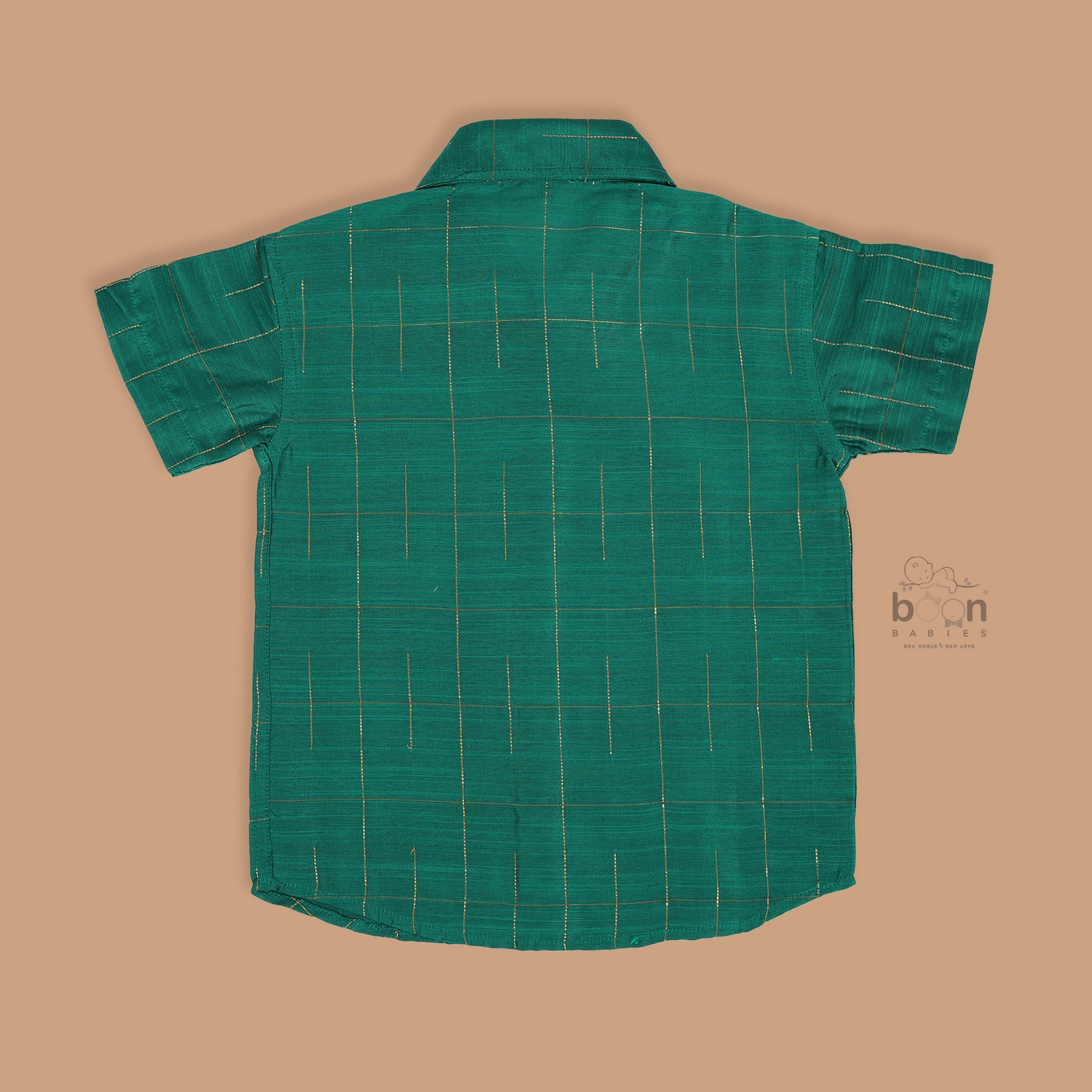 Green silk checked shirt with white dhoti featuring golden border – traditional South Indian boys ethnic wear set by Boon Babies.
