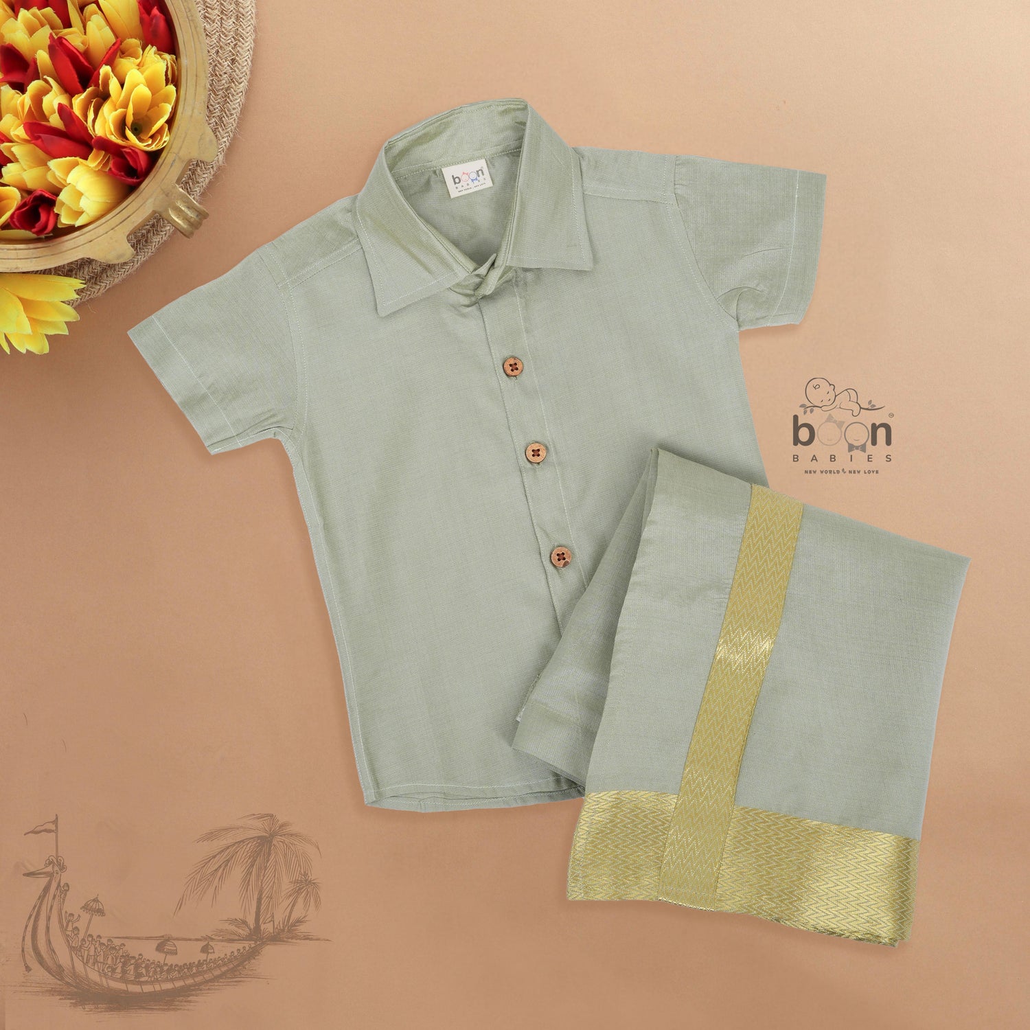 Green-silver silk shirt & dhoti with golden zari border for boys aged 6M–5Y. Perfect festive outfit for Onam & traditional celebrations.