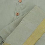 Green-silver silk shirt & dhoti with golden zari border for boys aged 6M–5Y. Perfect festive outfit for Onam & traditional celebrations.