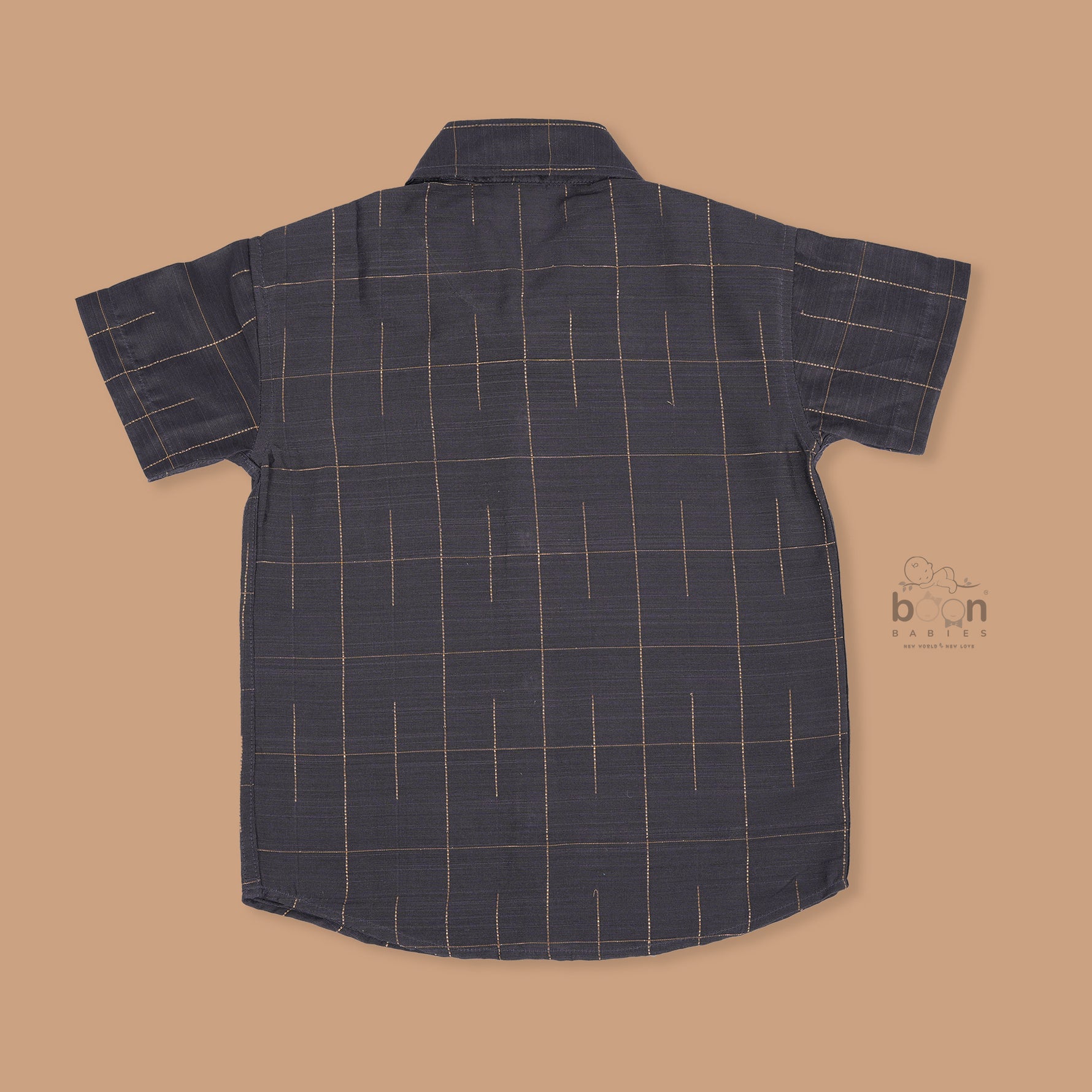 Boys ethnic silk shirt in navy with checked pattern paired with white and gold bordered dhoti, displayed flatlay style – festive wear from Boon Babies.
