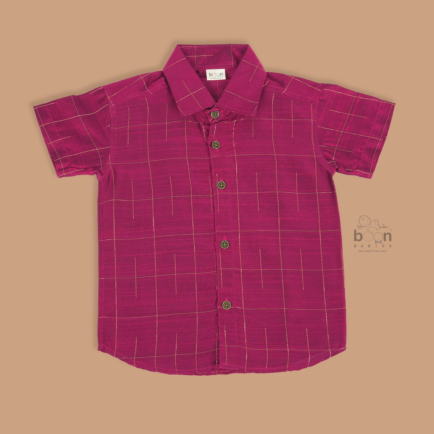 Boys festive outfit with maroon silk checked shirt and white dhoti with gold border – ethnic South Indian look from Boon Babies.
