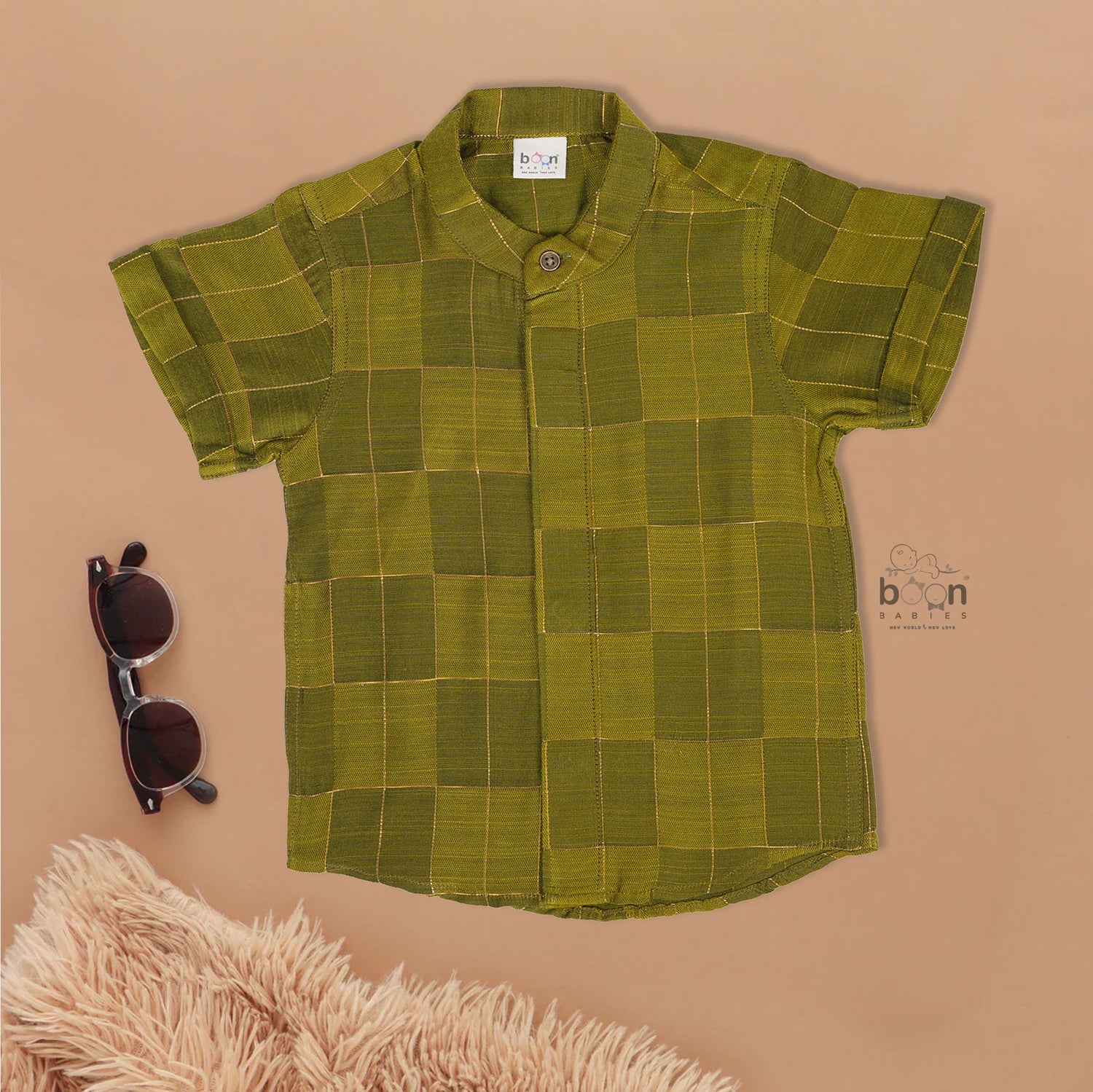 Olive green Chinese collar checked silk shirt with matching white dhoti and gold border – boys festive traditional wear by Boon Babies.
