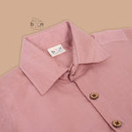Rose pink silk shirt & dhoti with golden zari border for boys aged 6M–5Y. Ideal festive wear for Onam & celebrations.