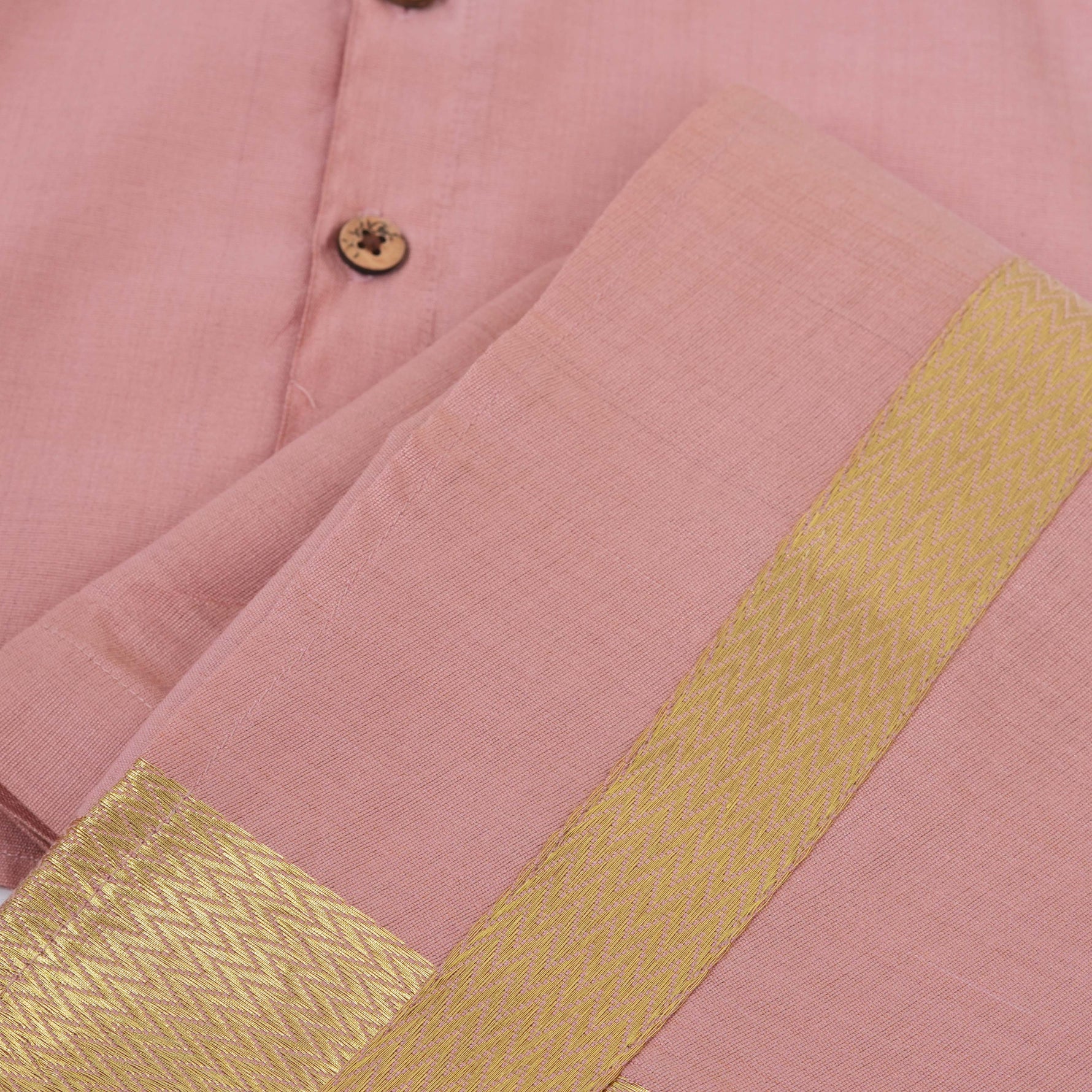 Rose pink silk shirt & dhoti with golden zari border for boys aged 6M–5Y. Ideal festive wear for Onam & celebrations.