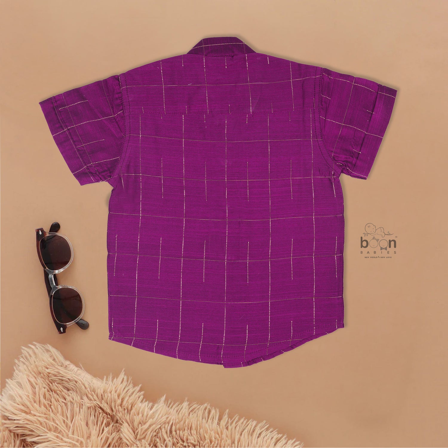 Purple checked silk shirt with Chinese collar and white dhoti with gold zari border – festive traditional wear for boys from Boon Babies.
