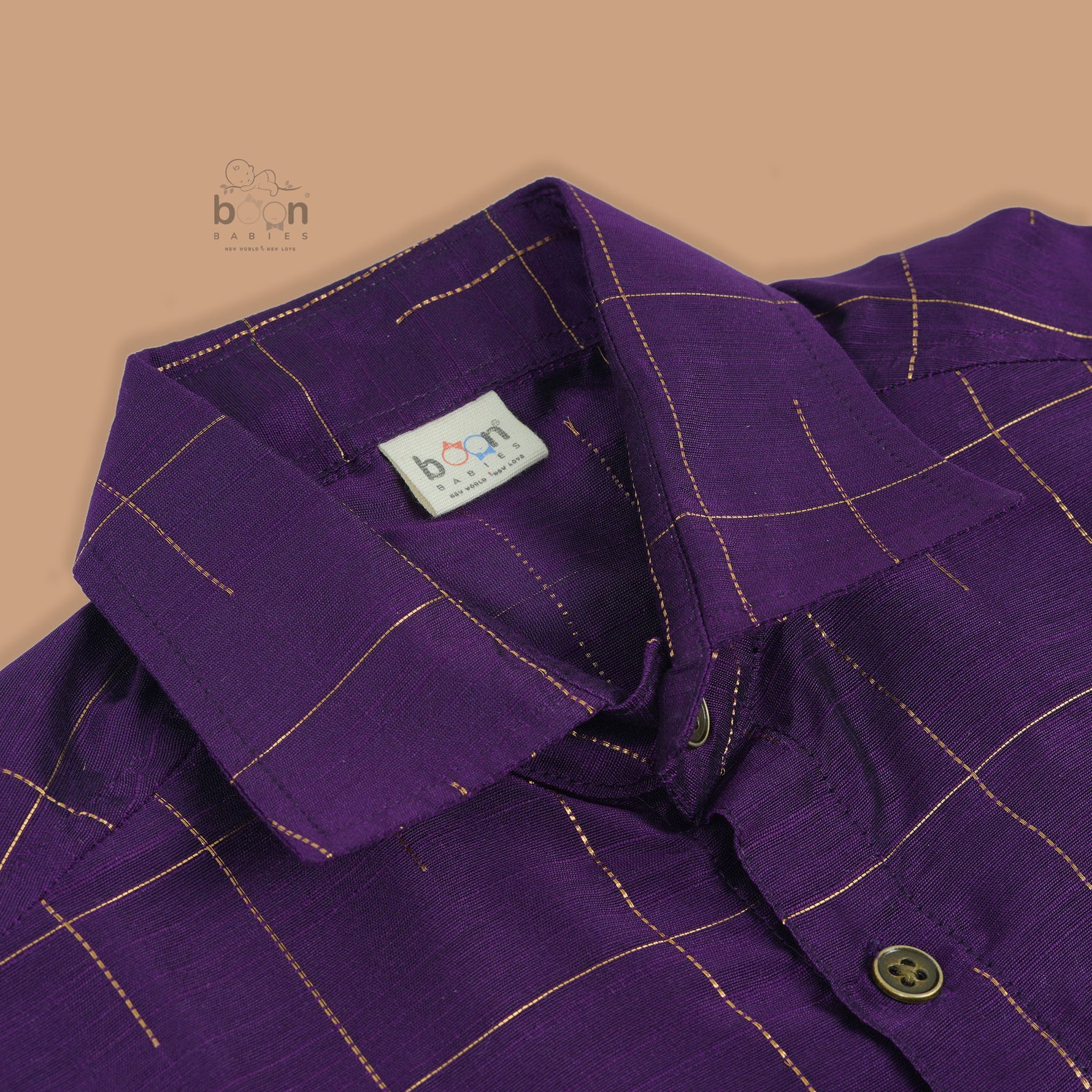 Boys festive outfit with maroon silk checked shirt and white dhoti with gold border – ethnic South Indian look from Boon Babies.
