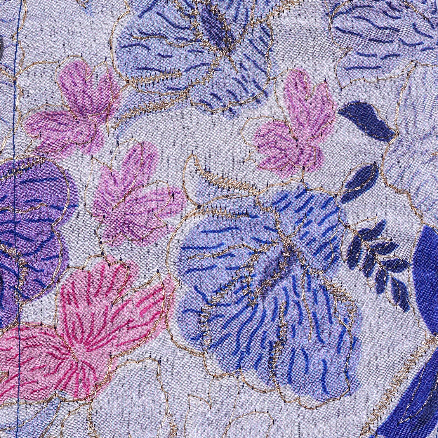 Royal blue silk panel shirt with floral embroidery paired with white pattu dhoti featuring a gold border – traditional festive outfit for boys by Boon Babies.
