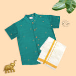 Festive teal green silk butta shirt with ivory dhoti & zari border for boys aged 6M–5Y. Traditional, stylish & comfortable.