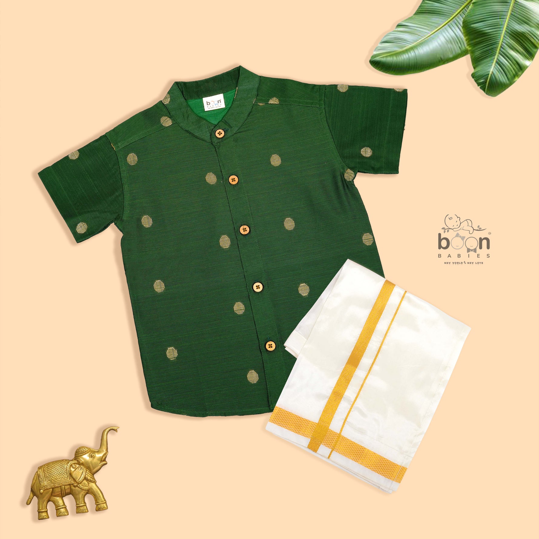 Elegant boys’ Dark green silk butta shirt & ivory dhoti with zari border. Festive & comfortable traditional wear for 6M–5Y.