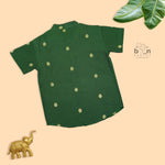 Elegant boys’ Dark green silk butta shirt & ivory dhoti with zari border. Festive & comfortable traditional wear for 6M–5Y.