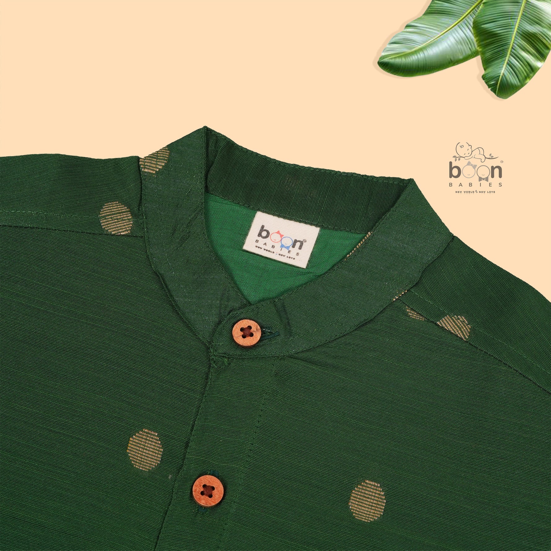 Elegant boys’ Dark green silk butta shirt & ivory dhoti with zari border. Festive & comfortable traditional wear for 6M–5Y.