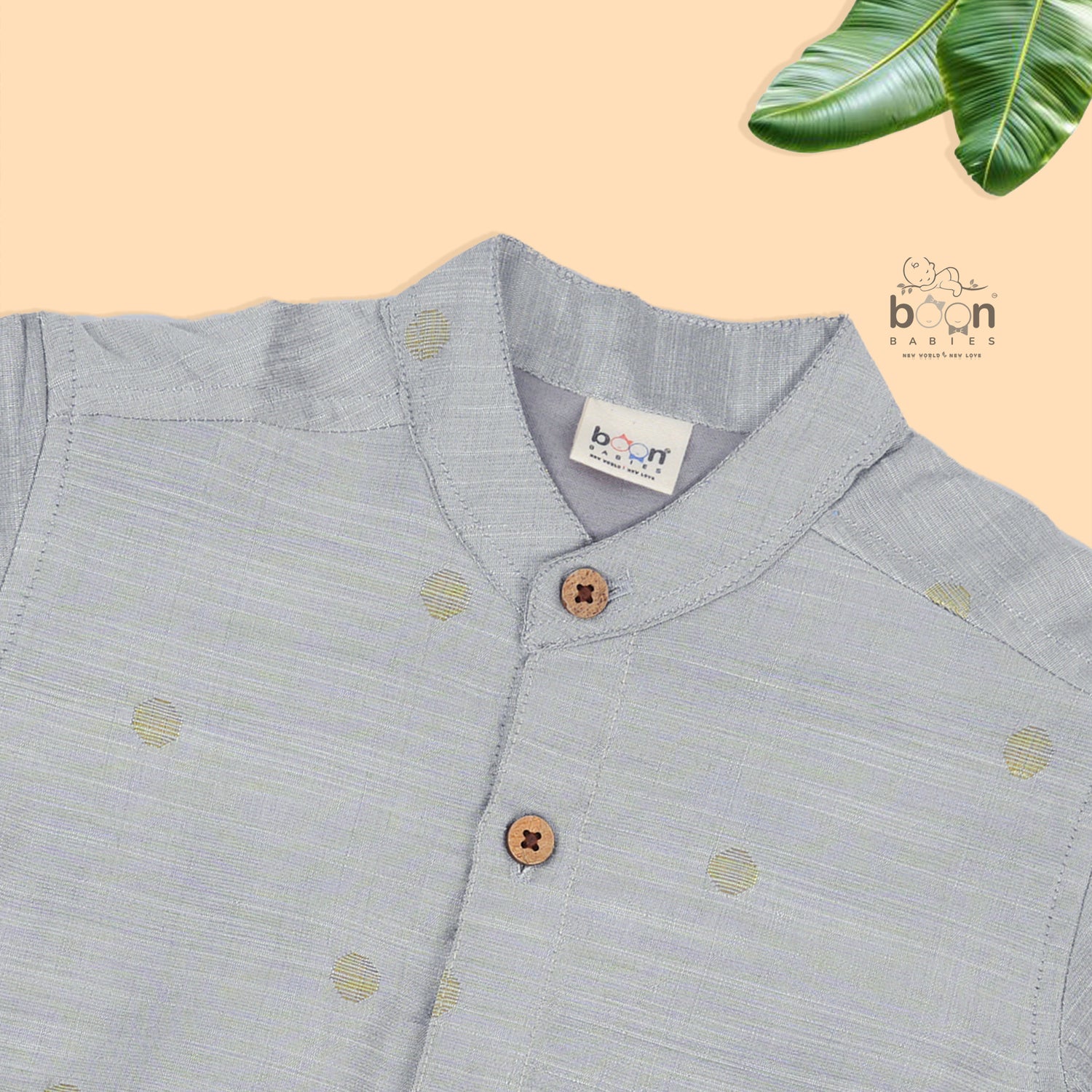 Boys’ traditional grey silk butta shirt with ivory dhoti & zari border. Elegant & comfortable festive wear for ages 6M–5Y.