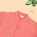 Elegant peach silk butta shirt with ivory dhoti & zari border. Festive & traditional wear for boys aged 6M–5Y.