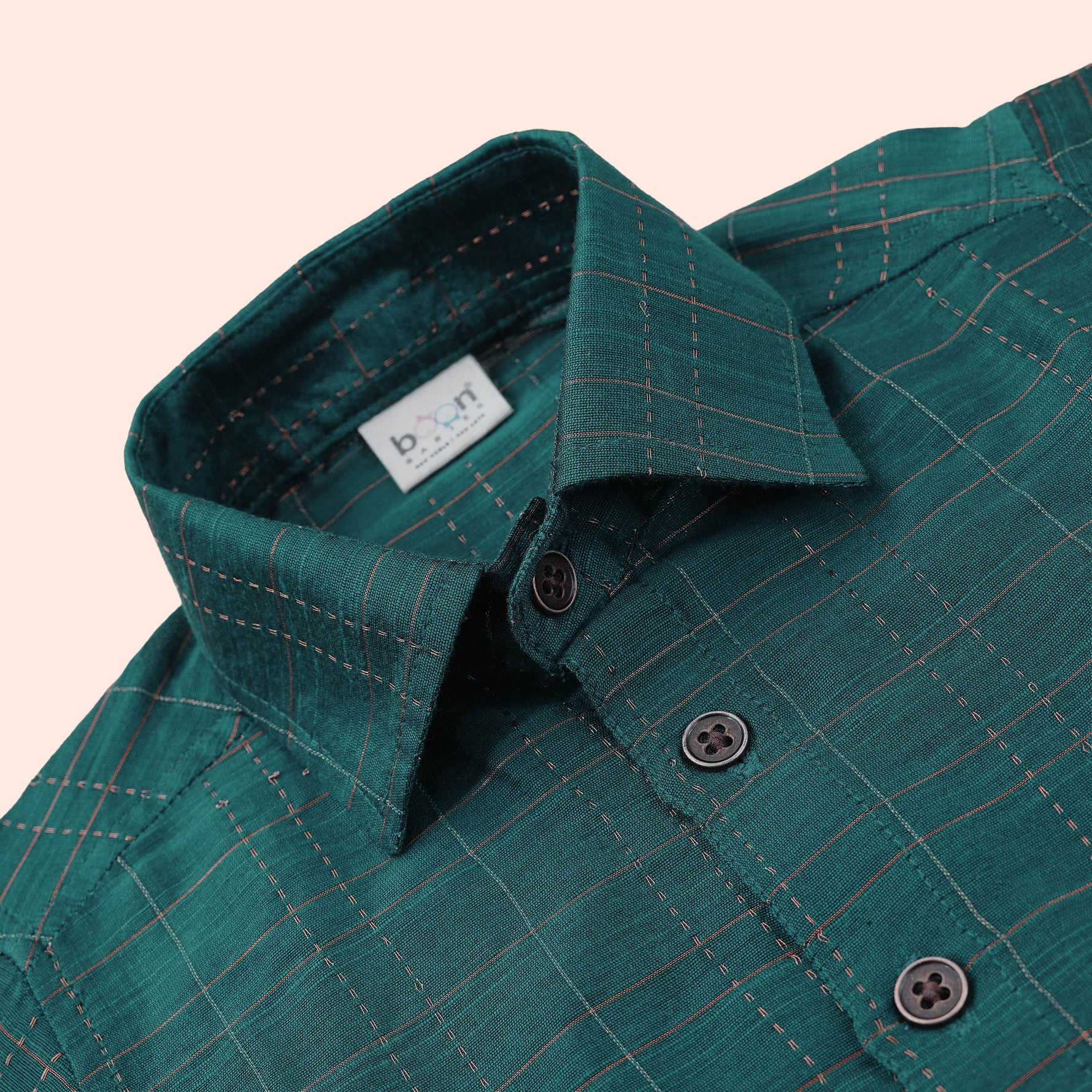 Elegant teal silk checkered shirt with golden-border dhoti — a premium, festive ethnic wear set for boys.
