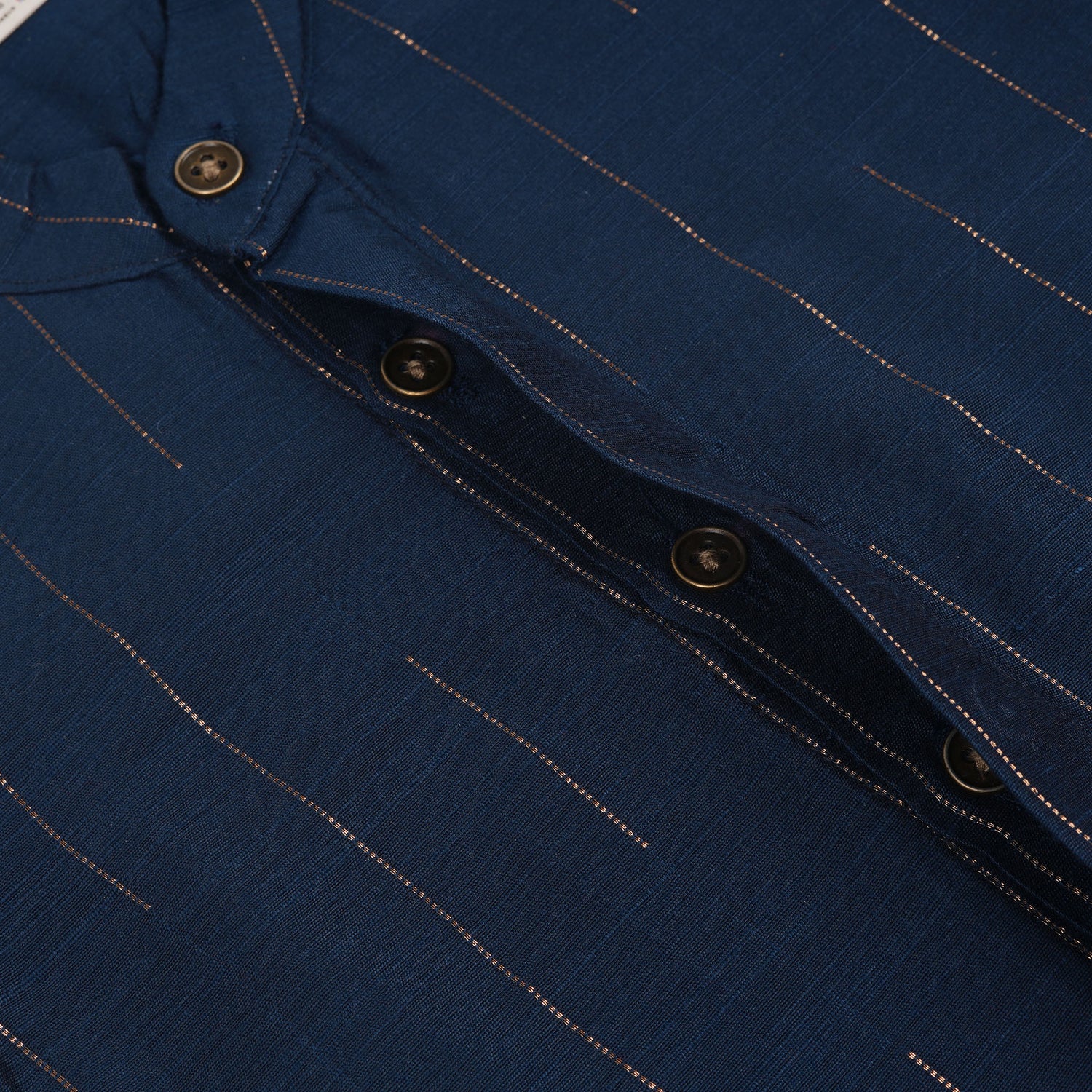 Teal blue checked silk shirt with Chinese collar and white dhoti with gold border – festive ethnic outfit for baby boys from Boon Babies.
