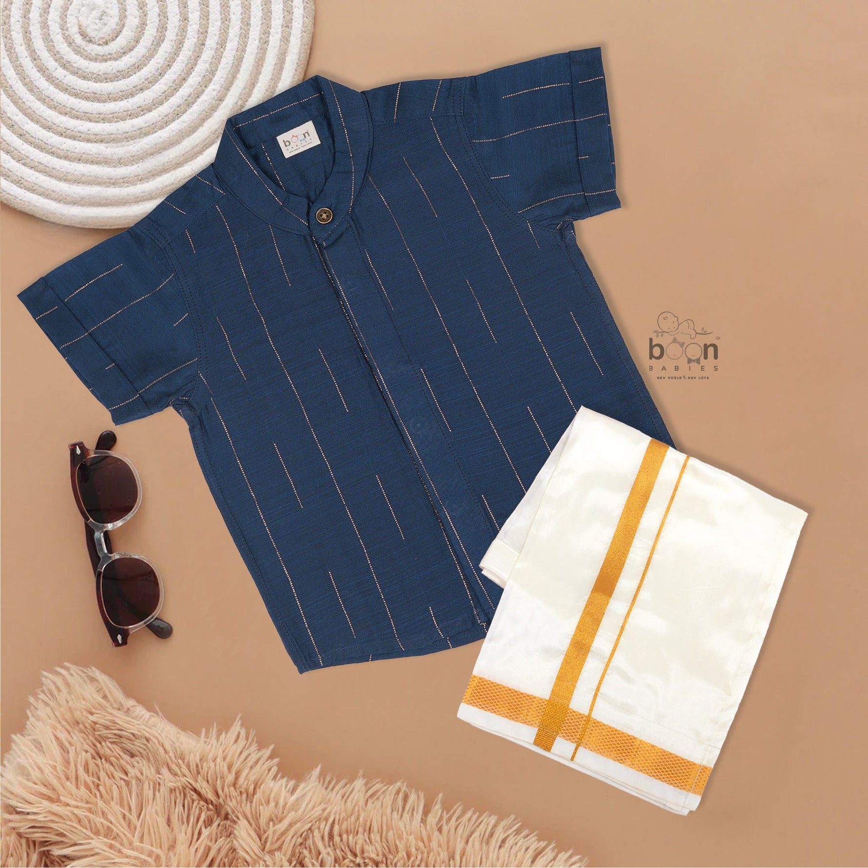 Teal blue checked silk shirt with Chinese collar and white dhoti with gold border – festive ethnic outfit for baby boys from Boon Babies.
