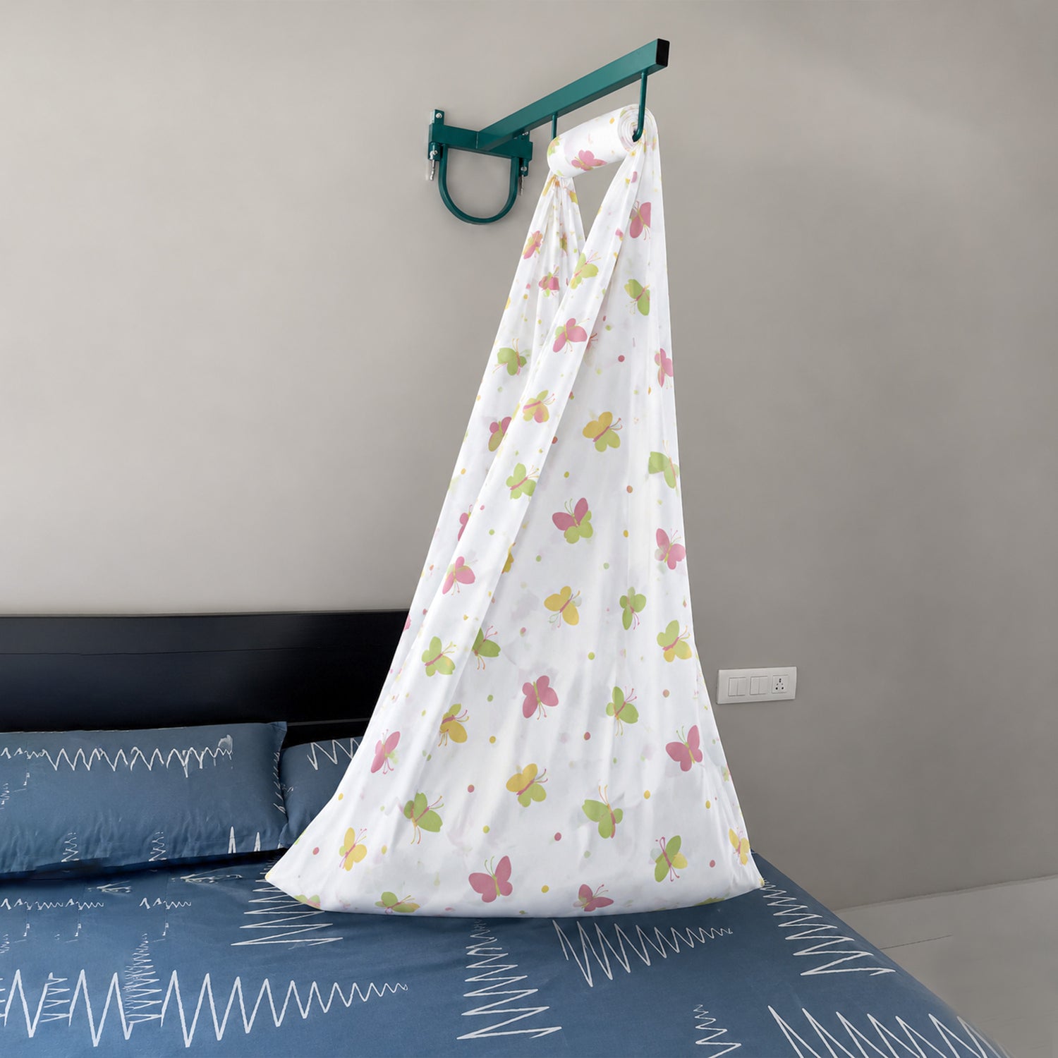 Printed newborn baby cotton cradle with butterfly design by Boon Babies, showcasing soft fabric and cozy bedding.