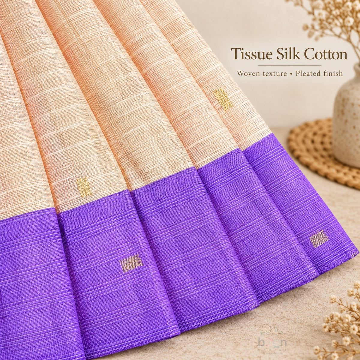 Woven tissue silk cotton texture, pleated skirt and purple border detail on cream baby girl knot frock