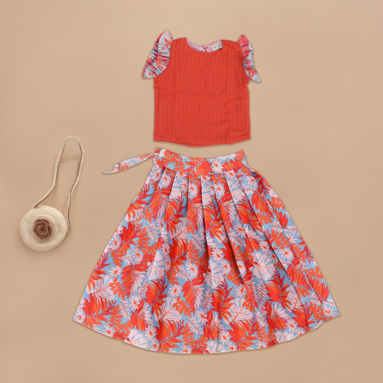 Adorable Red Top with Colorful Floral Skirt – Effortless Style for Any Event