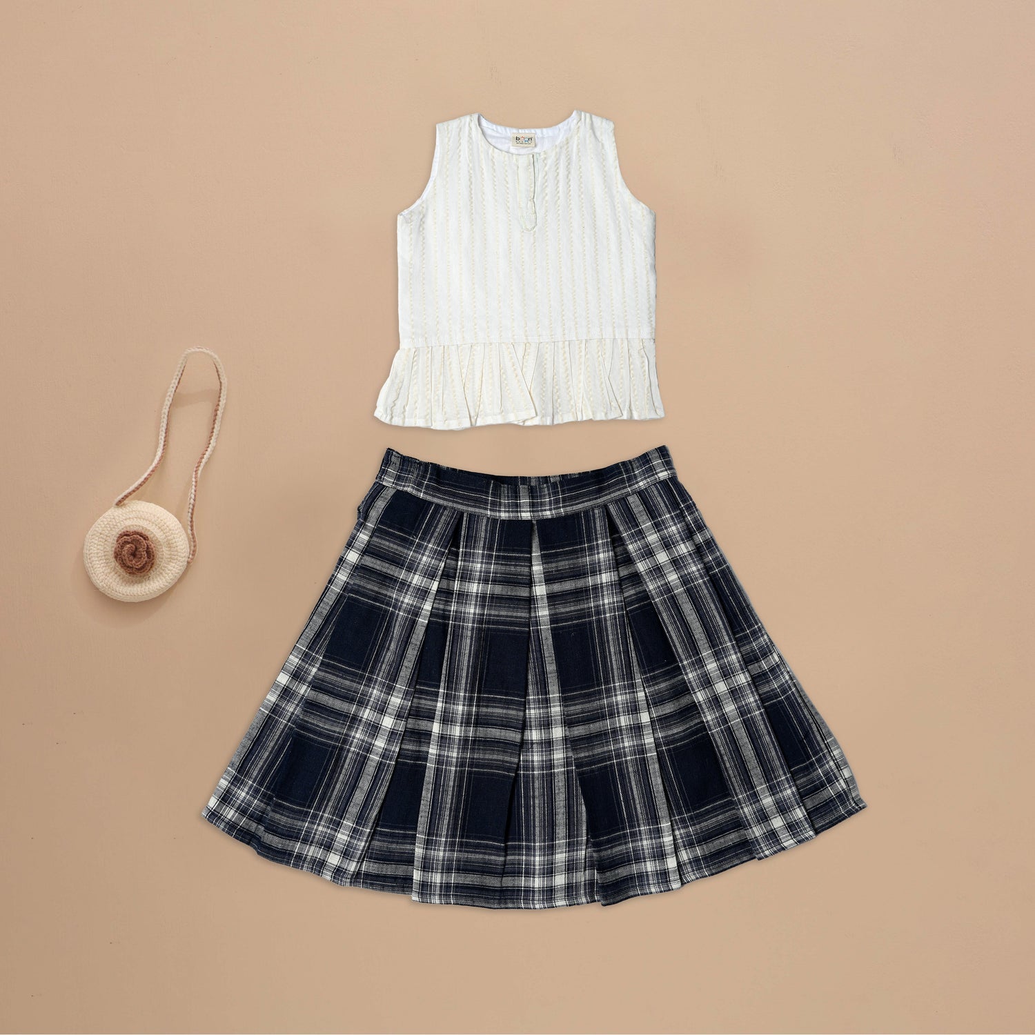 Minimalist Chic: Classic Striped Top and Checked Skirt Combo