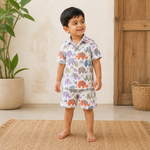 Pink Jaipur Cotton elephant print shirt and matching shorts for kids, featuring a straight collar and summer-ready design.