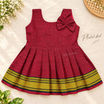 Maroon Mangalagiri cotton baby girl frock front view with pleated skirt and shoulder bow