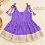 Purple tissue silk cotton baby girl knot frock back view with shoulder tie fastening and pleated skirt